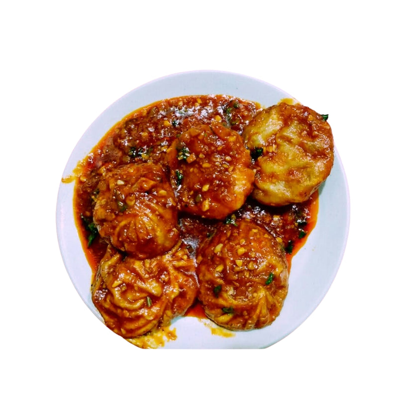 Schezwan Momos  (Steam/Fry/Malai Gravy)